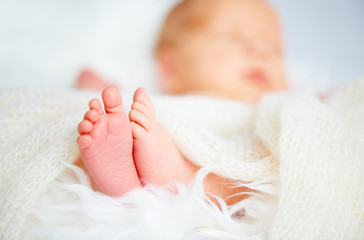 foot leg newborn baby sleeping