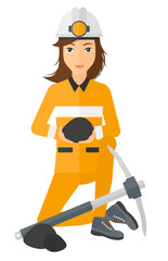 Miner holding coal in hands.