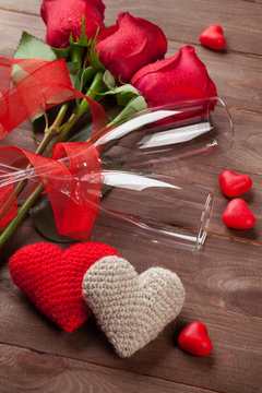Red roses, hearts and champagne glasses
