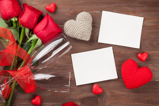 Valentines day photo frames, champagne and red roses