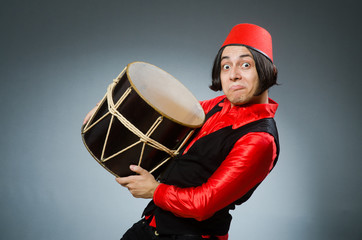 Man wearing red fez hat
