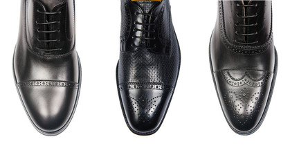 Selection of male shoes isolated on white