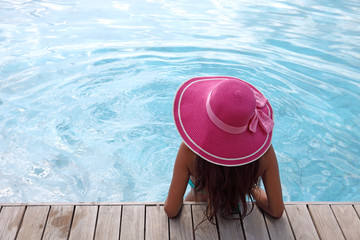 Fototapeta na wymiar Woman in swimming pool