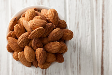 almond nut organic healthy snack vegan vegetarian white background
