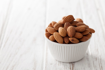 almond nut organic healthy snack vegan vegetarian white background