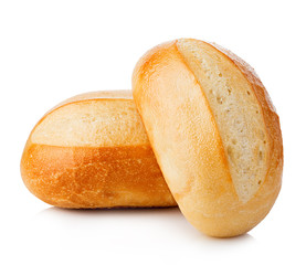 Two loaves of fresh homemade bread close-up isolated on a white background.