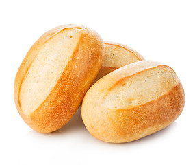 Three loaves of fresh homemade bread close-up isolated on a white background.