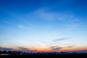 Fotobehang Hemel The blue sky in the evening