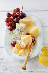 cheese platter with grapes