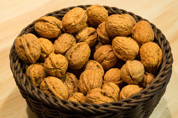 Walnuts on a rustic wooden table