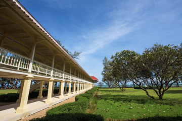 Fototapeta na wymiar Marukhathaiyawan Palace wooden bridge in Cha-Am
