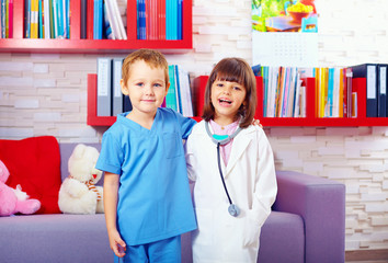 portrait of cute kids playing doctors