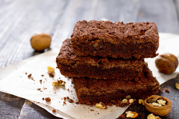 Chocolate brownie cake on a dark wooden table