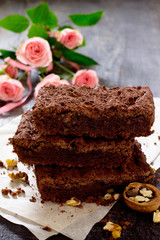 Chocolate cake with walnuts Brown and pink roses