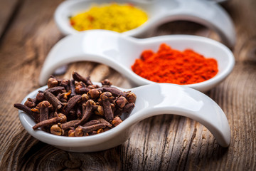 Dry spices in spoon.