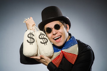 Funny man with money dollar sacks