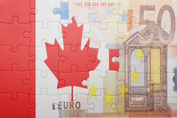 puzzle with the national flag of canada and euro banknote