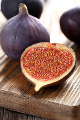Fresh figs on a wooden cutting board