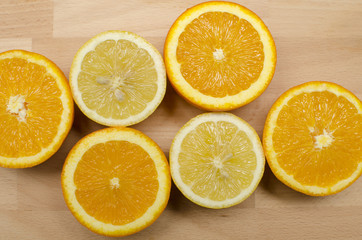 Fototapeta na wymiar Sliced oranges and lemons