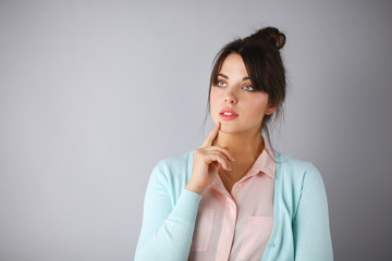 Portrait of an attractive fashionable young brunette woman