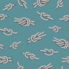 Seamless pattern with white ropes and marine knots over green background, vector illustration
