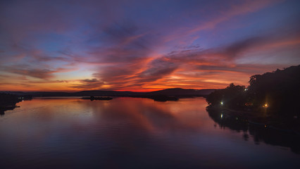 Gorgeous sunrise over a river between Goa and Maharashtra states in India 