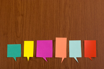 The Handmade Colorful Origami Balloons on the Wooden Background