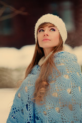 Attractive young woman in wintertime outdoor