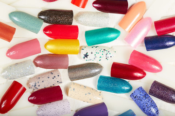Artificial nails different colored with nail polish