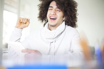 Young man listening music