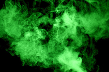 Obraz na płótnie Canvas green steam on the black background
