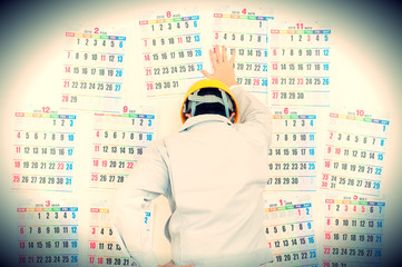 カレンダー,問題を抱える工事現場の男性