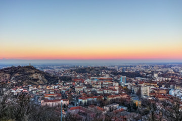Sunset Landscape of city of Plovdiv from Dzhendem tepe hill, Bulgaria