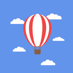 Obraz premium Hot air balloon on blue background.