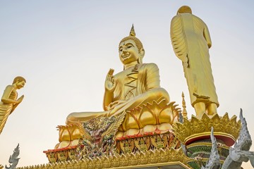 Fototapeta premium Golden Buddhism sculpture in Wat Prom Vi Harn Temple - LoengNoktha, Yasothon, Thailand (They are public domain or treasure of Buddhist) (No restrict in copy or use)(In public temple)
