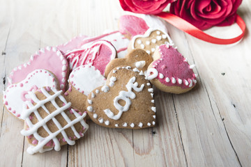 Festive cookies with hearts and roses for Valentine's Day.