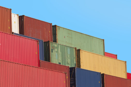 Lots of Colorful Cargo Containers. Industrial Background.