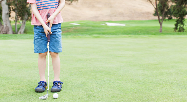 Kid Playing Golf