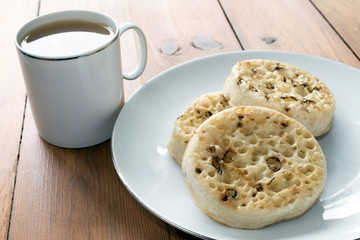 Tea and Crumpets on Wooden Table