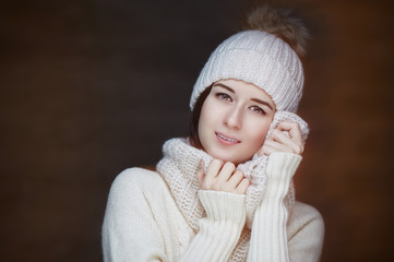 A girl in warm white clothes.