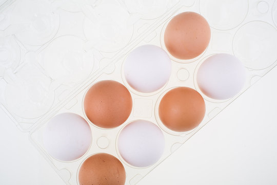 Brown organic eggs and white eggs