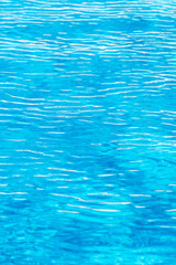 Ripples on the water in the swimming pool.