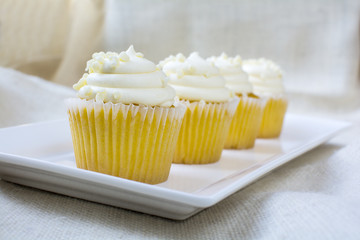 Four french vanilla cupcakes dessert