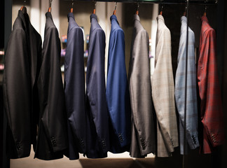 Men suits in a fashion store.