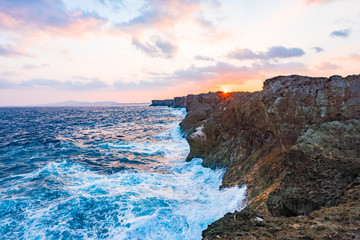Fototapeta na wymiar Sunrise, sea, cliffs, seascape. Okinawa, Japan. 
