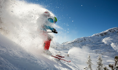 Man freerider running downhill