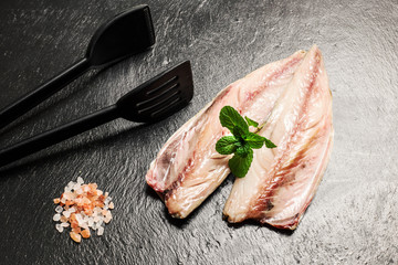 raw fresh mackerel fillet with pink himalayan  and mint salt ove