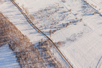 aerial view  over the harvest fields in winter
