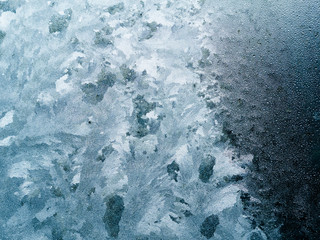 Frozen window, ice texture and background. Ice on window.