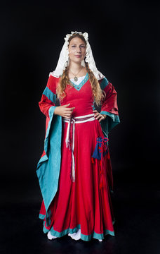 Portrait of medieval girl wearing red
